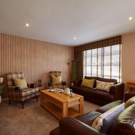 Macdonald Woodland Lodges At Macdonald Aviemore Resort Exterior photo